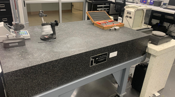 SURFACE PLATE CALIBRATION AND REFINISHING